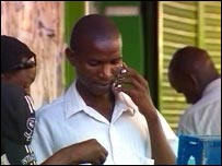 African mobile phone user. Photo: � BBC News