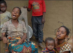 "We have lost four children in four months to fever," says Therese Tchausi (seated). Local health official Merveille Njolombe says malnutrition is a big problem in villages like Misoke. "We also see a lot of malaria, bilharzia and intestinal worms." Some 727,000 people died in excess of normal mortality between January 2006 and April 2007 and nearly half of these were among children under the age of five. 