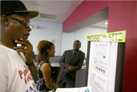 People seeking work last week at the one-stop career center in Fort Lauderdale, Fla., which offers job training, listings and access to several welfare programs.  Photo: Eric Thayer/New York Times
