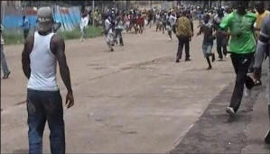 Guineans fleeing from the site of the massacre. Photo: BBC