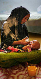 A mother feeds her malnourished child in the malnutrition ward in a hospital in the town of Kebri Dehar, in the Somali region of Ethiopia. Photo: David Bebber/The Times