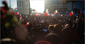 Thousands of antigovernment protesters returned to Pearl Square in Manama, Bahrain, on Saturday after the police and troops withdrew in what appeared to be a conciliatory move. Photo: Andrea Bruce/New York Times
