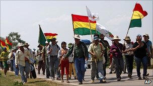 The marchers (shown here)  say the road threatens their ancestral territory by encouraging illegal deforestation and settlement.   Photo: AP