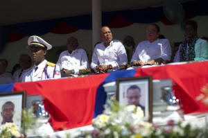 THE CENTER OF POWER President Michel Martelly of Haiti, center, seated between Prime Minister Evans Paul, whose predecessor was ousted in December, and Sophia Martelly, the first lady, who has been targeted in a corruption complaint. Credit Hector Retamal/Agence France-Presse — Getty Images