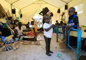 Nuer refugees from ethnic fighting in a tent in a United Nations camp near the Juba airport. Photo: James Akena/Reuters