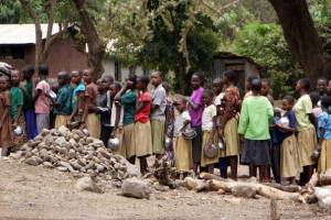 Students line up for lunch at a school in Engaruka, Tanzania in early September. Photo: Sharon Schmickle/Washington Post
