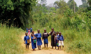 Eight rural Ugandan children on their way to school.