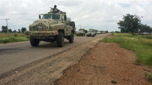 Nigerian army vehicle driving along a highway.  Photo: Nigerian Defense Headquarters